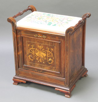 An Edwardian inlaid mahogany piano stool with fall front, inlaid musical trophies, the seat with tapestry panel decorated Royal Cypher 1953, raised on ogee bracket feet 22"h x 21"w x 14"d 