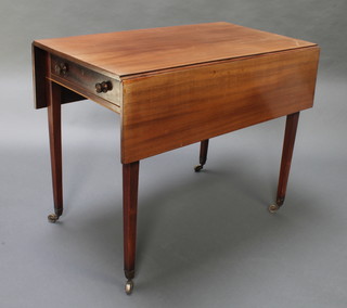 A 19th Century bleached mahogany Pembroke table, fitted 2 frieze drawers, raised on square tapering supports  brass caps and casters 28"h x 35 1/2"w x 19" when closed x 37" when open  