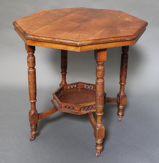 An Edwardian octagonal mahogany 2 tier occasional table raised on turned supports with galleried shaped undertier 28 1/2"h x 29"w x 29"d 