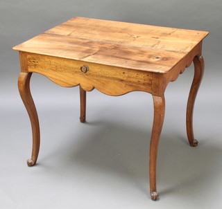 A 19th Century French fruitwood side table fitted a drawer with shaped apron, raised on cabriole supports 27 1/2"h x 32 1/2"w x 24"