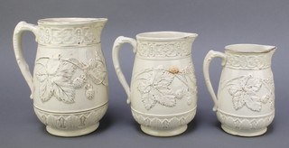 3 19th Century graduated pottery jugs with gilt banding and floral decoration, marked S F & Co 7 1/2", 7" and 6" together with 3 Victorian graduated pottery jugs decorated blackberries 8 1/2" (chip to spout) 7 1/2" (cracked)  and 6" (cracked) 