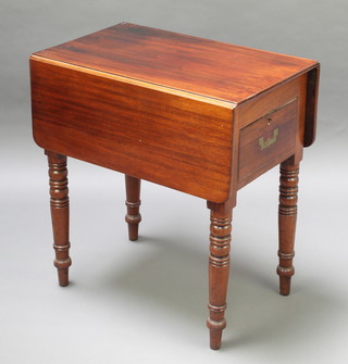 A Victorian mahogany campaign style Pembroke table fitted a cupboard enclosed by a panelled door raised on ring turned supports 28"h x 25 1/2"l x 16"w x 35 1/2" when extended 