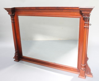 A Victorian rectangular bevelled plate over mantel mirror contained in a mahogany frame with moulded and dentil cornice supported by 2 columns with carved capitals 39"h x 52"w x 6"d 