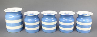 5 circular T G Green & Co blue and white striped Cornish kitchen ware storage jars, all with green shield mark to the base 7" and 5" 