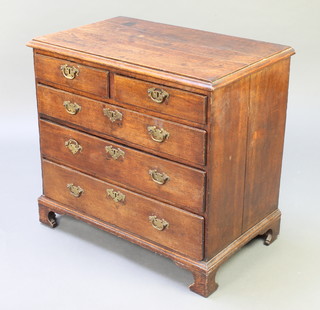 An 18th Century oak chest of 2 short and 3 long graduated drawers raised on bracket feet with brass swan neck drop handles 29"h x 31"w x 18"d 