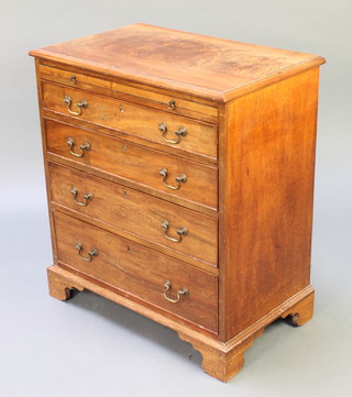 A Georgian style mahogany chest with brushing slide above 4 long graduated drawers with brass escutcheons, swan drop handles, raised on bracket feet 31"h x 27 1/2"w x 17"d  