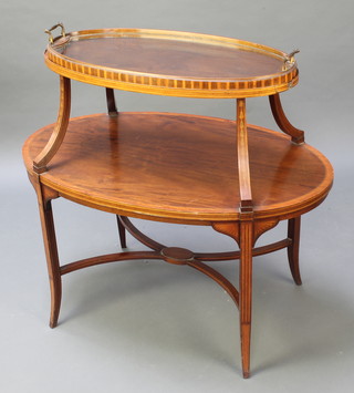 An Edwardian oval inlaid mahogany 2 tier etagere raised on square tapered supports with X framed stretcher 32"h x 35"w x 21 1/2"d 