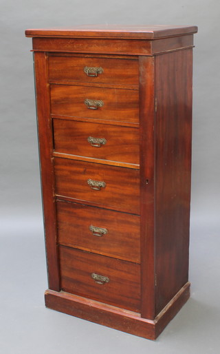 An Edwardian Art Nouveau mahogany Wellington chest of 6 drawers raised on a platform base 49 1/2"h x 22 1/2"w x 16"d 