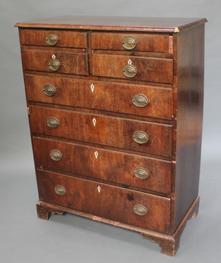An 18th Century walnut chest of 4 short and 4 long drawers with ivory escutcheons and oval plate drop handles, raised on bracket feet 49"h x 37 1/2"w x 19"d 