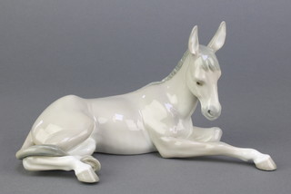 A Lladro figure of a reclining donkey 5.83, 8 1/2", boxed