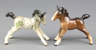 A Beswick figure of a dappled foal 4", a ditto of a brown foal 3" 