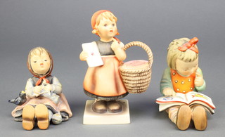 3 Hummel figures - Bookworm no.8 4 1/2", girl with basket 18/0 5 1/2", seated girl with bird 69 3 1/2" 