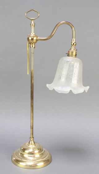 A Victorian style brass adjustable table lamp with etched glass shade 