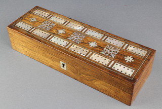 A Victorian rectangular inlaid rosewood card box, the top inlaid a cribbage board 2" x 11" x 4" containing 2 packs of cards (complete but slightly dog eared), 4 turned mother of pearl crib markers, 3 ditto ivory and 4 brass markers 