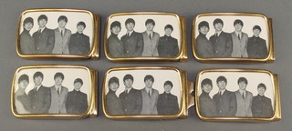 6 1960's gilt metal belt buckles decorated photographs of The Beatles