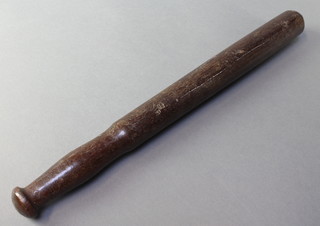 A plain turned wooden Metropolitan Police truncheon, decorated a crown and marked MP 17" 