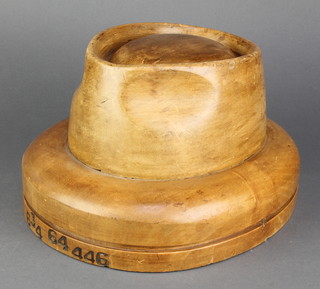 A wooden homburg hat form marked 634 64446  