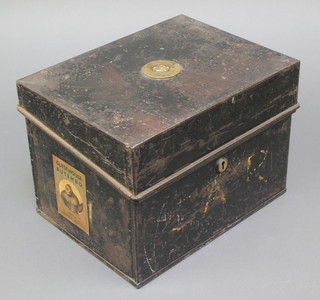 A rectangular 19th Century metal deed box with hinged lid having 2 facsimile labels to the side North German Lloyd and Guest-house Butembo 7 1/2"h x 10 1/2"w x 8"d 