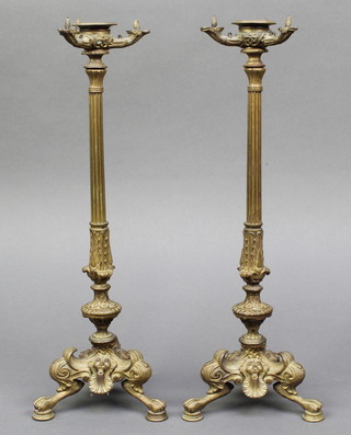 A pair of 19th Century reeded gilt ormolu candlesticks raised on 3 hoof feet 14" 