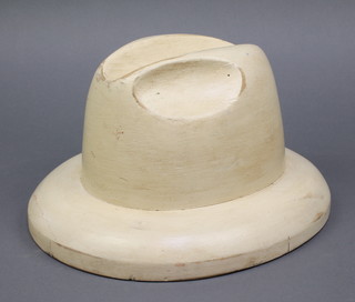 A wooden homburg hat form the interior marked 59 1439 