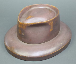 A wooden hat form interior marked 1459 