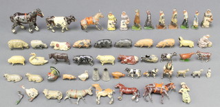 A collection of various Britains figures of farmyard animals 