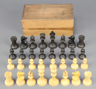A wooden Staunton pattern chess set 