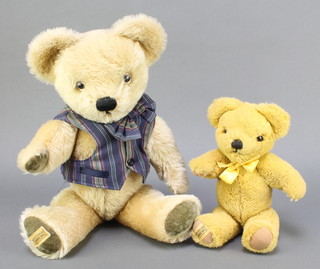 A Merrythought yellow bear with articulated limbs 10" and Merrythought musical bear wearing a waistcoat 16" 