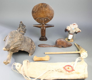 An Ashanti wooden fertility doll 14" (chip to base), a carved figure in the form of an elephant with attendant, leather quiver and other curios 