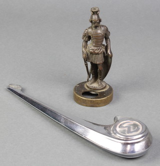 A car mascot in the form of a standing warrior with shield 4 1/2" (hole to head) together with a Morris Minor mascot 8" 
