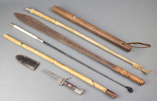 A Boy Scout style knife with 4 1/2" blade, a turned wooden truncheon, a bamboo swagger stick, 2 riding whips and an Eastern double sided sword with 24" double edged blade 