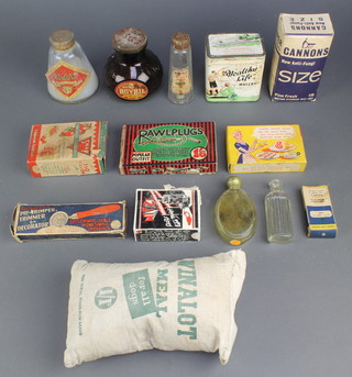 A glass jar of Bovril, a small sack of Winalot meal and other items of packaging 