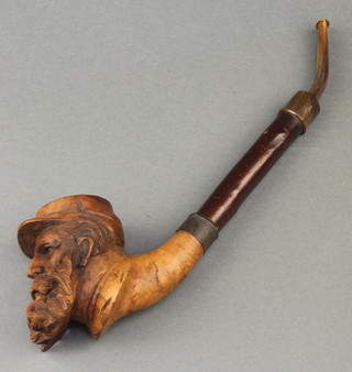 A 19th Century carved wooden pipe, the bowl in the form of a bearded gentleman (possibly a confederate soldier) 