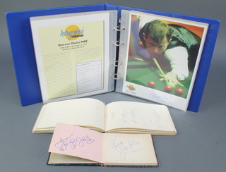 An autograph album containing various autographs including Virginia Wade, Lester Piggott, Jeff Hurst, David Gower, Johnnie Francombe, Henry Cooper, George Best and others together with 2 other albums some containing footballers 