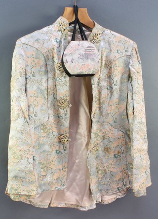 A lady's Chinese embroidered silk jacket together with a matching hand bag