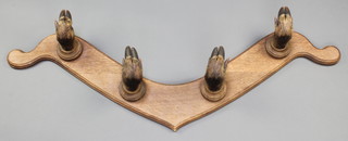 A Victorian oak and stag taxidermy mounted coat rack 44" 
