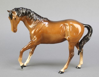 A Beswick figure of a brown race horse 10" 