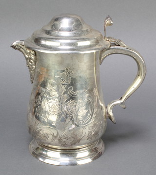 A Georgian style engraved silver plated lidded jug 7 1/2", a silver butter knife and a silver bladed butter knife with mother of pearl handle 