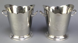 A pair of plated 2 handled tapered wine coolers with chased armorials 9" 