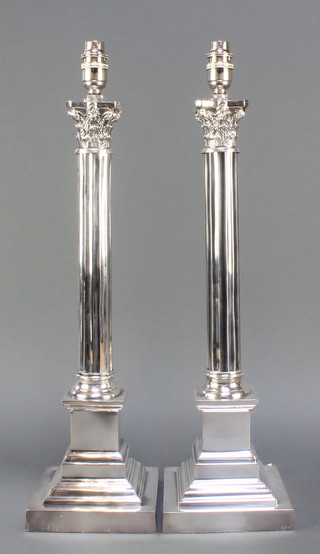 A pair of plated Corinthian column table lamps with stepped bases 19" 