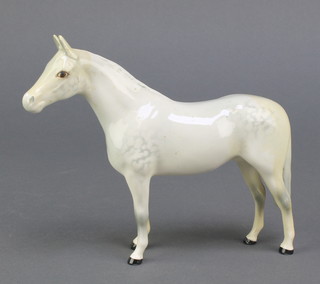 A Beswick figure of a white dappled horse 7" 