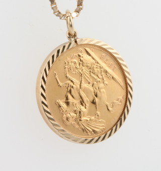 A 1976 sovereign in a 9ct yellow gold mount with chain, 6 grams