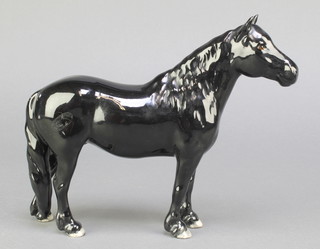 A  Beswick figure of a black horse 9" 