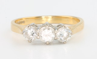 A 18ct yellow gold 3 stone diamond ring, approx. 0.75ct, size L 