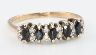 A 9ct yellow gold sapphire and diamond ring, size P 1/2
