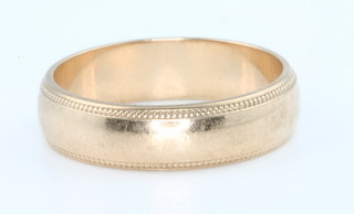 A 9ct yellow gold wedding band, 4 grams size N  