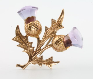 A 9ct yellow gold amethyst set thistle brooch 