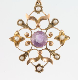An Edwardian 9ct gold amethyst and seed pearl pendant on a plated chain 
