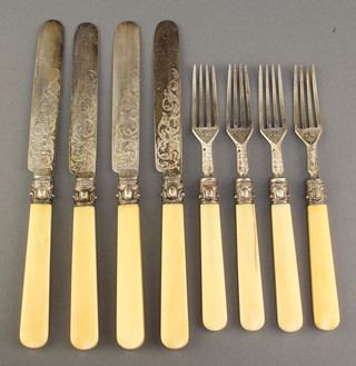Four Victorian silver bone handled knives and forks with chased decoration London 1866/67 