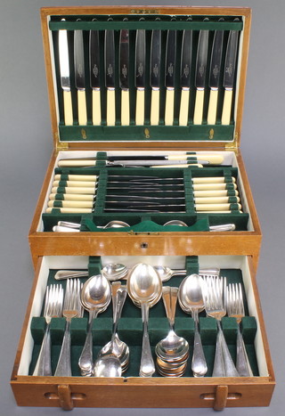 An Art Deco style canteen containing a set of silver plated cutlery for 6 